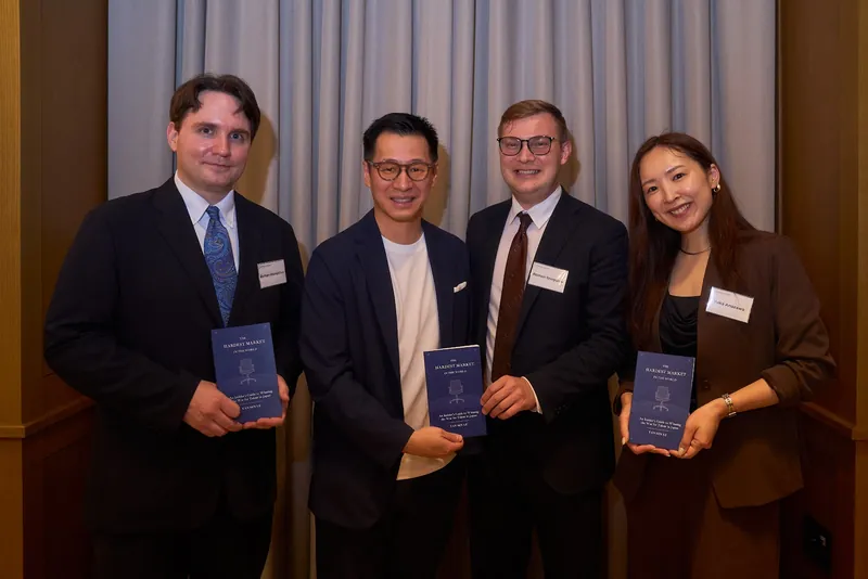 International guests with copies of The Hardest Market