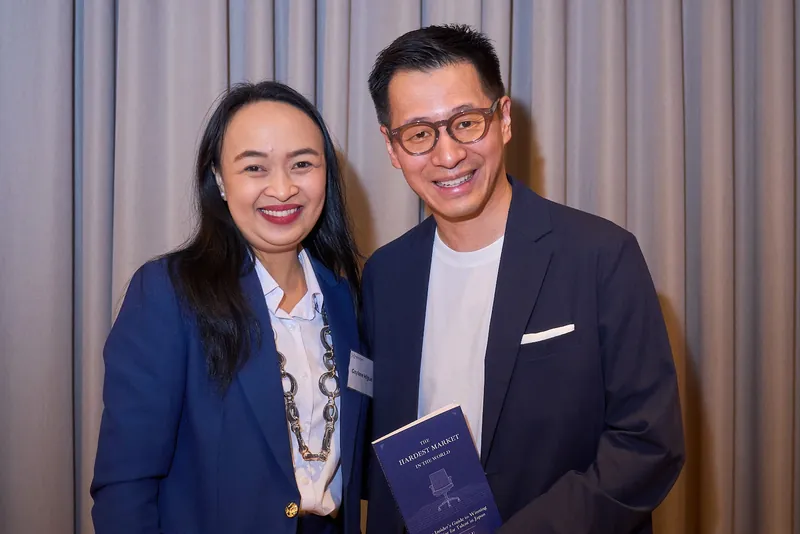 Yan Sen Lu sharing a laugh with a guest